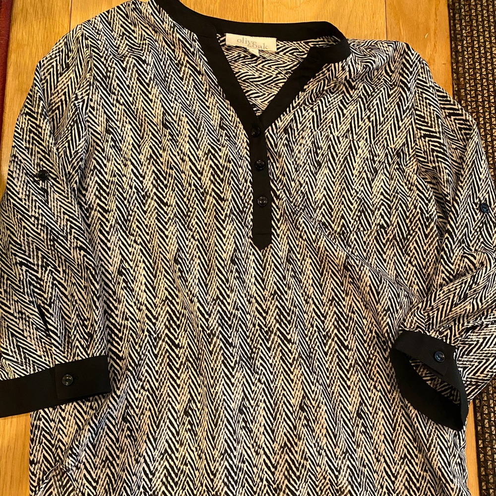 Woman’s size small olive and oak shirt